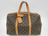 Louis Vuitton Sac Souple Handbag Monogram Canvas