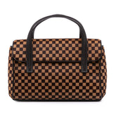 Damier Sauvage Lionne