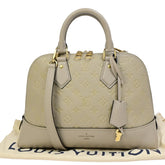 Louis Vuitton Neo Alma Handbag Monogram Empreinte Leather