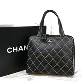 Chanel Surpique Zip Around Satchel Quilted Leather