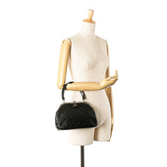 CC Quilted Lambskin Kiss Lock Frame Top Handle Bag