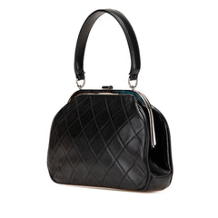 CC Quilted Lambskin Kiss Lock Frame Top Handle Bag