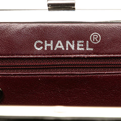 CC Quilted Lambskin Kiss Lock Frame Top Handle Bag