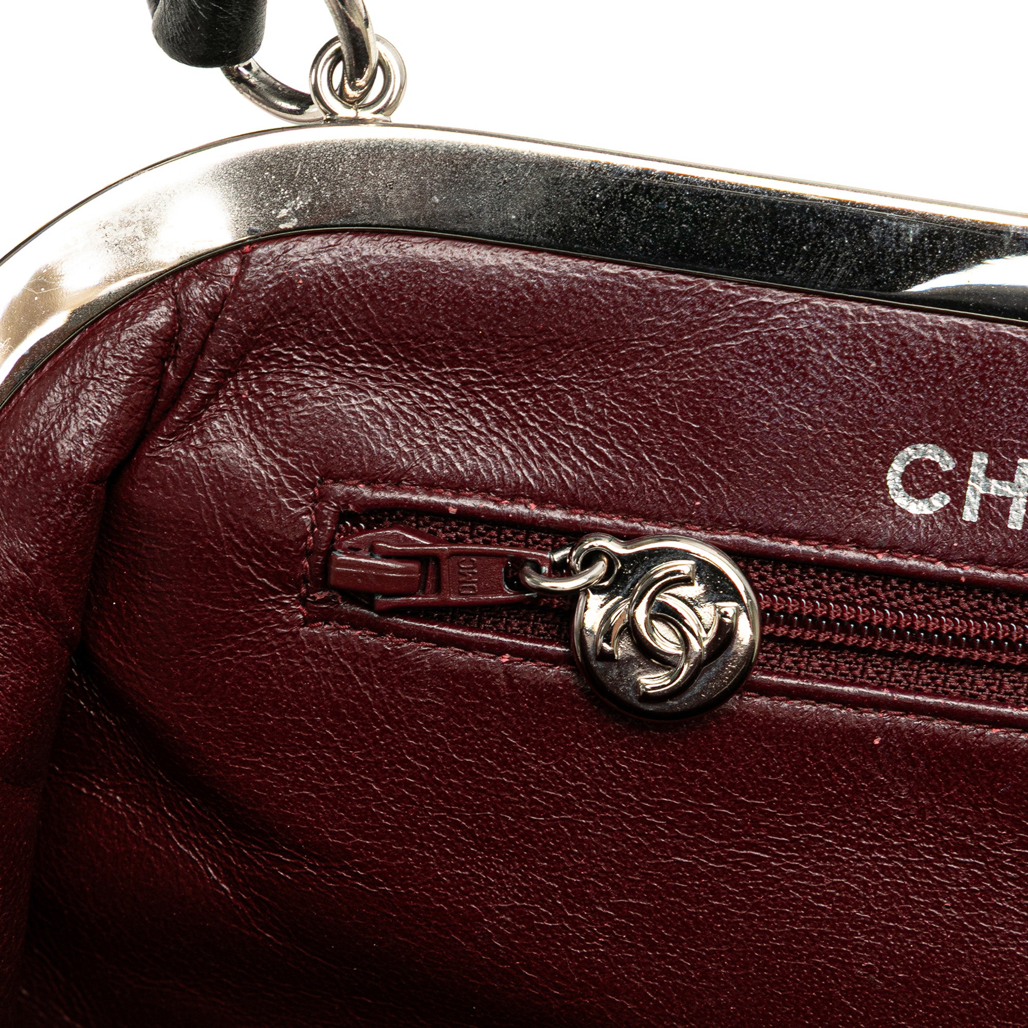 CC Quilted Lambskin Kiss Lock Frame Top Handle Bag