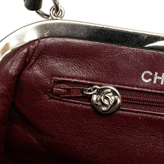 CC Quilted Lambskin Kiss Lock Frame Top Handle Bag