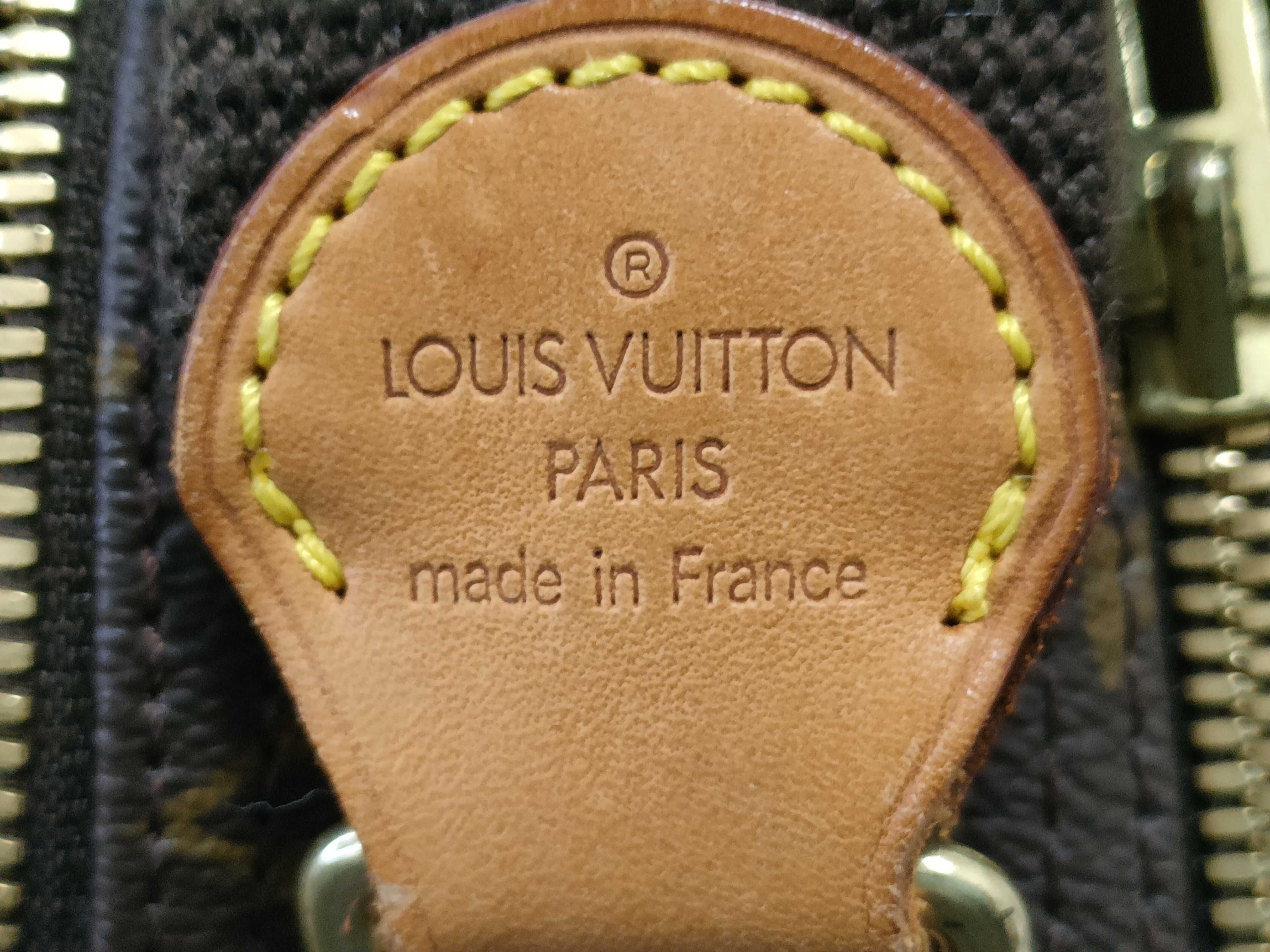 Louis Vuitton Reporter