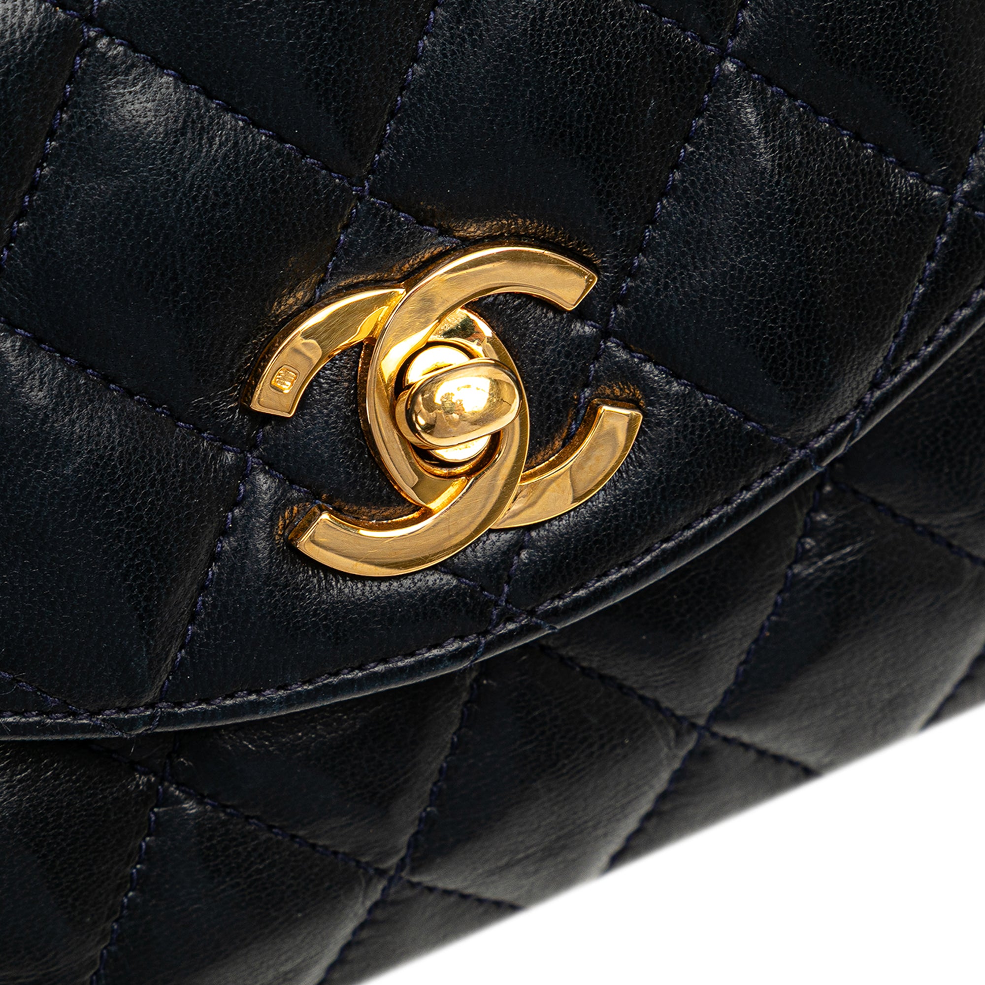 CC Quilted Lambskin Round Flap
