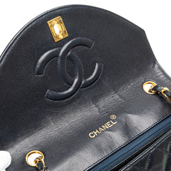 CC Quilted Lambskin Round Flap