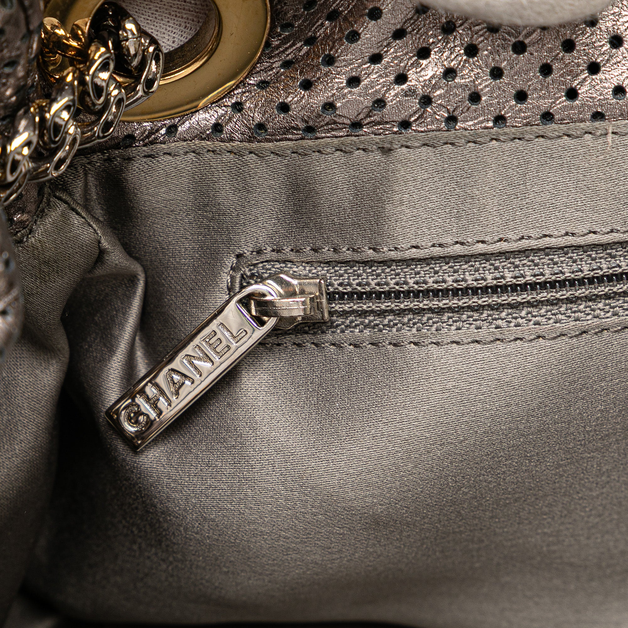 Metallic Perforated Calfskin Drill Accordion Flap