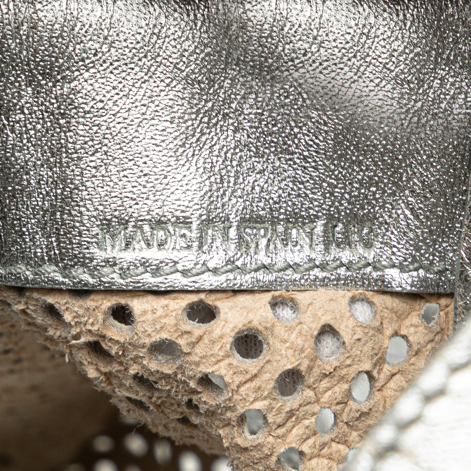 Perforated Metallic Calfskin Sling Backpack