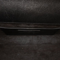 Leather Star Studded Cassandre Clutch