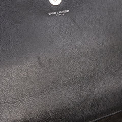 Leather Star Studded Cassandre Clutch