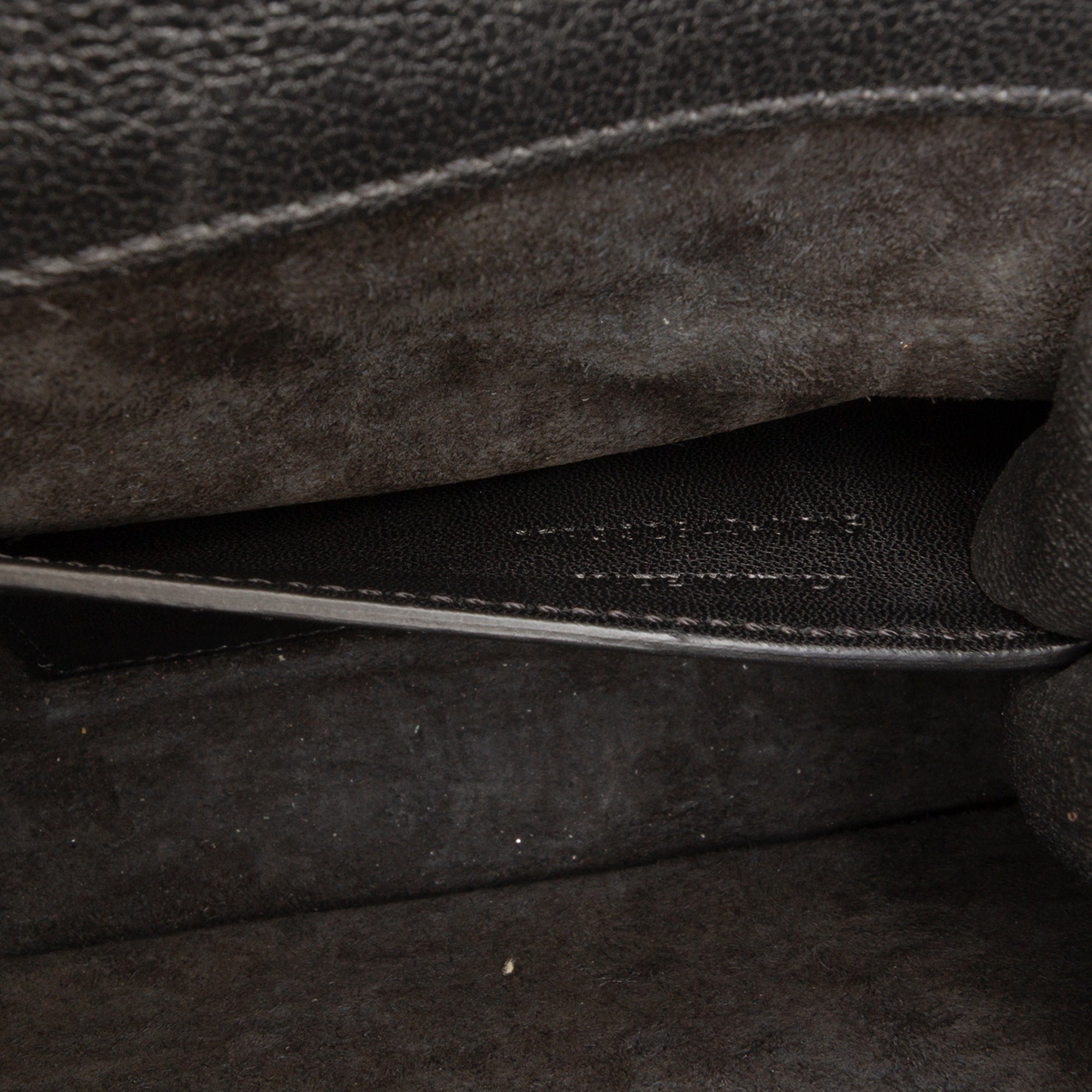 Leather Star Studded Cassandre Clutch