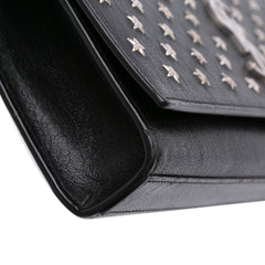 Leather Star Studded Cassandre Clutch