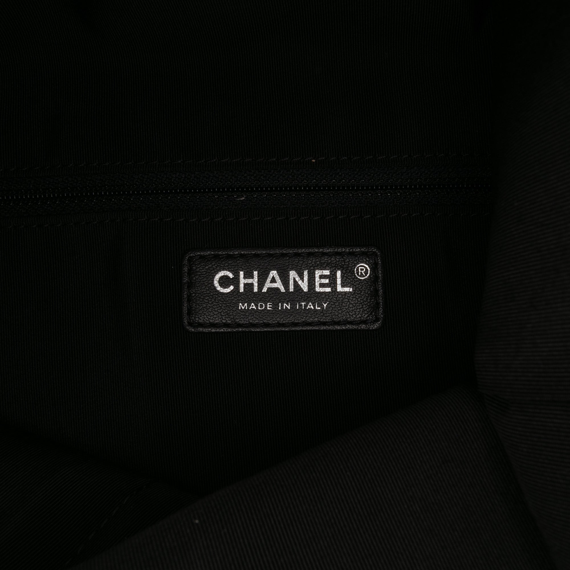 CC Quilted Lambskin Grip Clutch