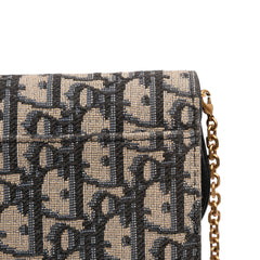 Oblique Canvas Saddle Wallet On Chain