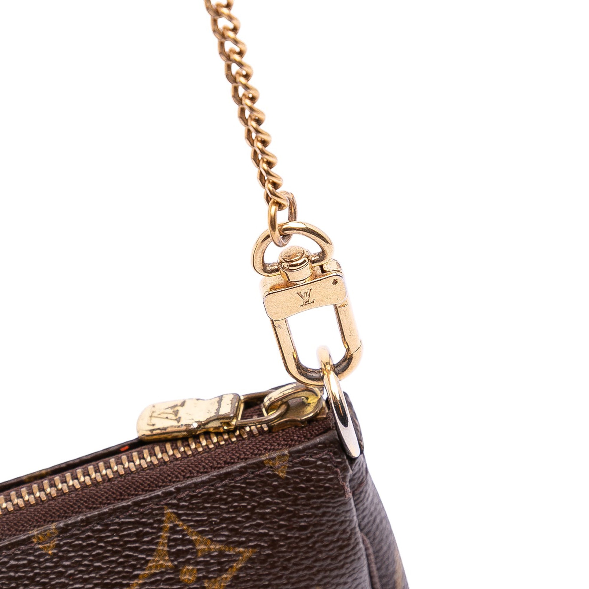 Monogram Trunks and Bags Mini Pochette Accessoires