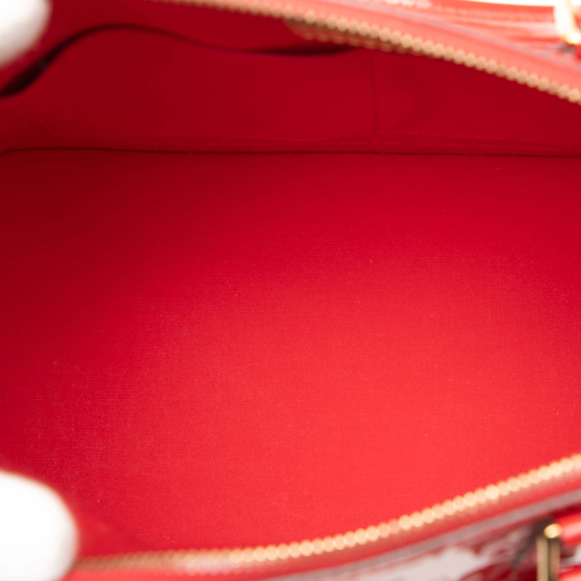 Monogram Vernis Alma PM