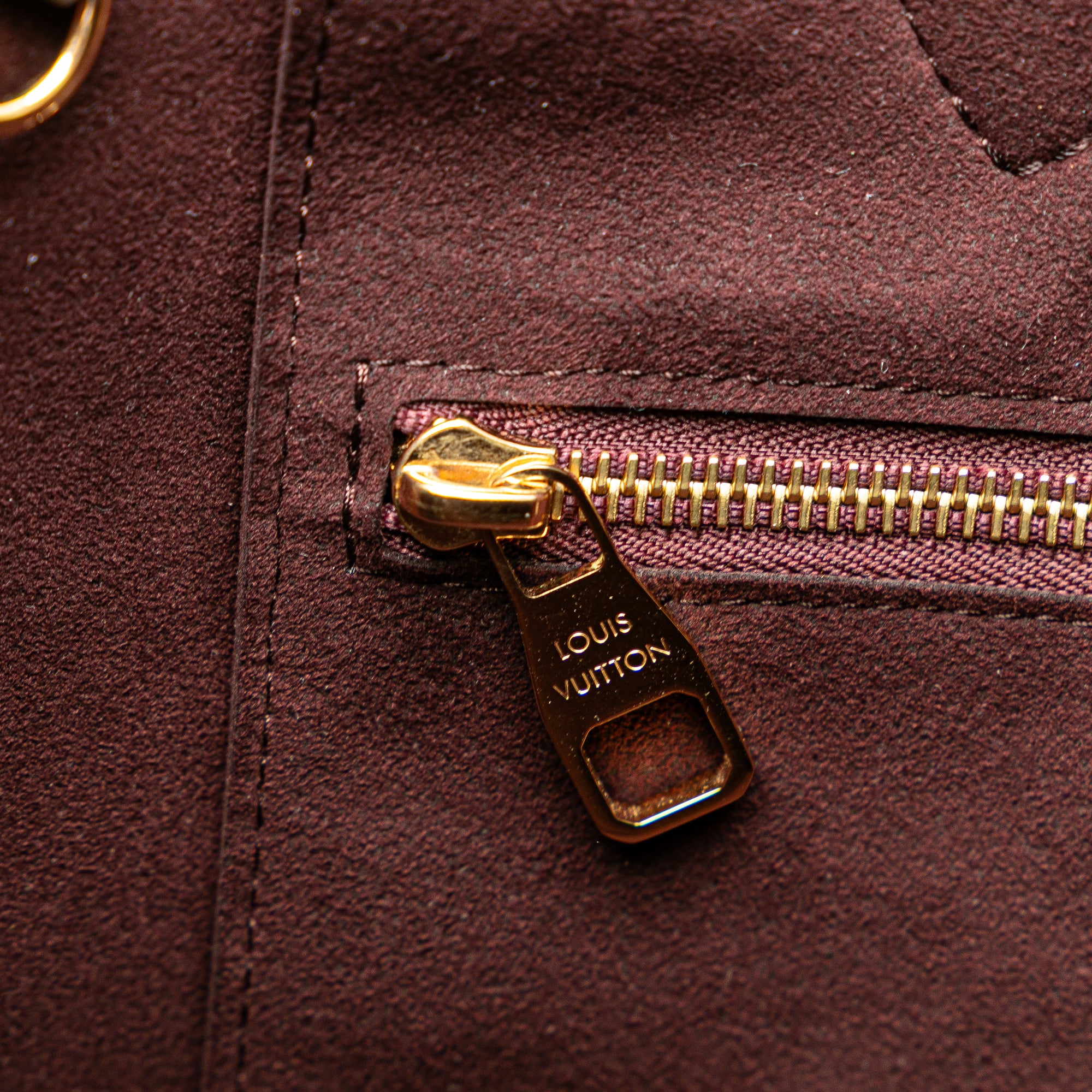 Monogram Giant Empreinte Neverfull MM