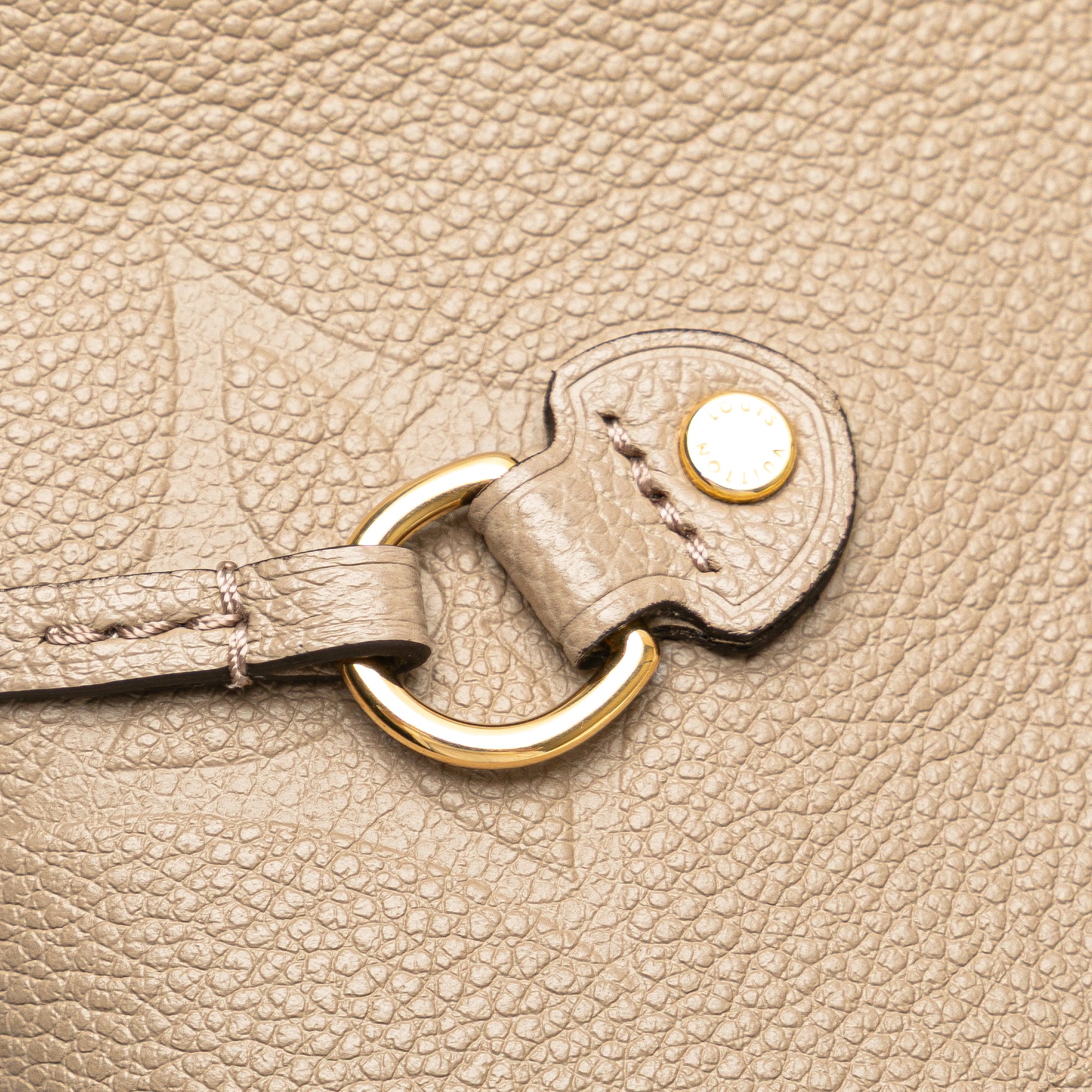 Monogram Giant Empreinte Neverfull MM