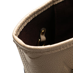 Monogram Giant Empreinte Neverfull MM