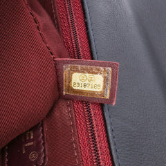 Medium Quilted Glazed Calfskin Gold Bar Top Handle Flap