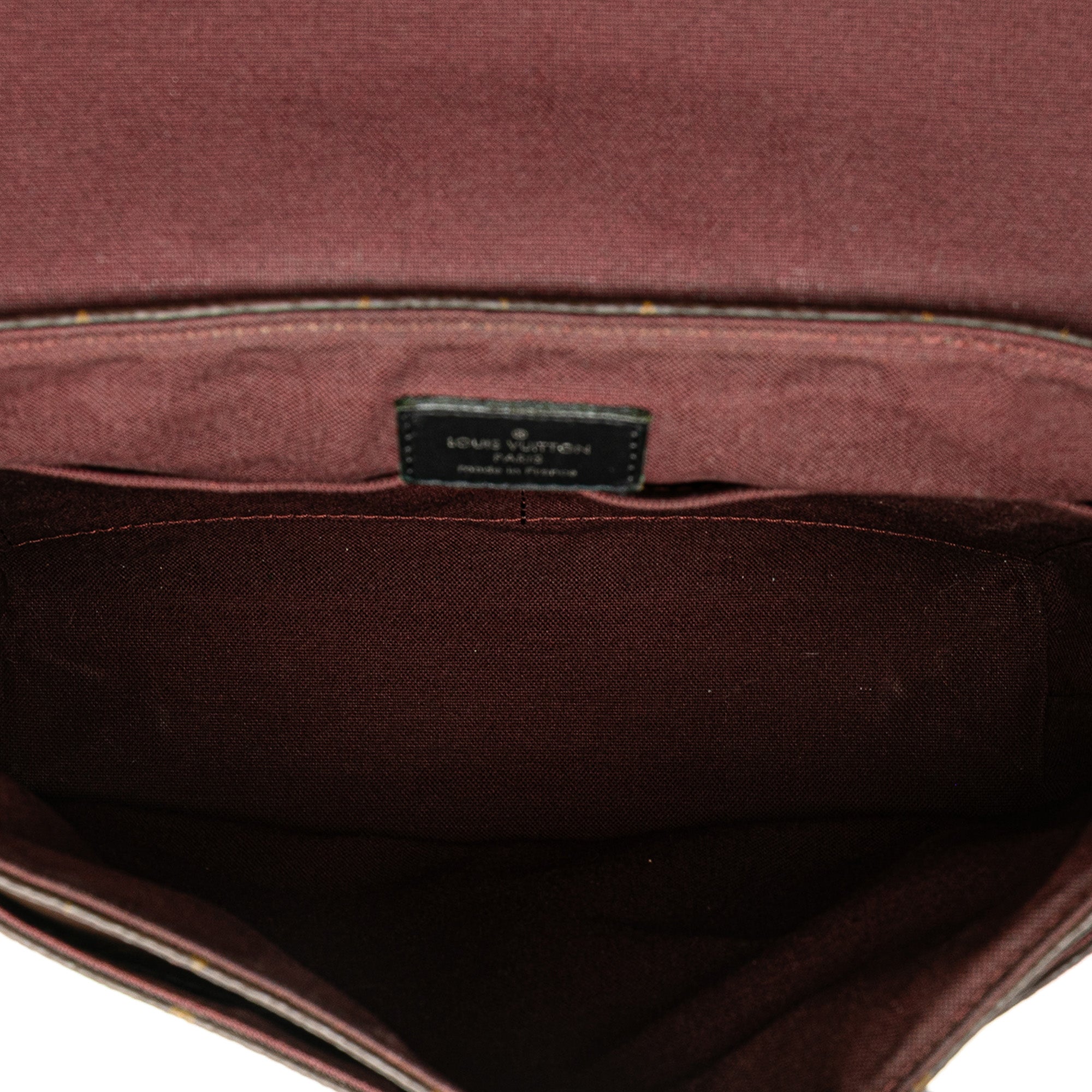Monogram Macassar District PM