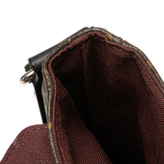 Monogram Macassar District PM