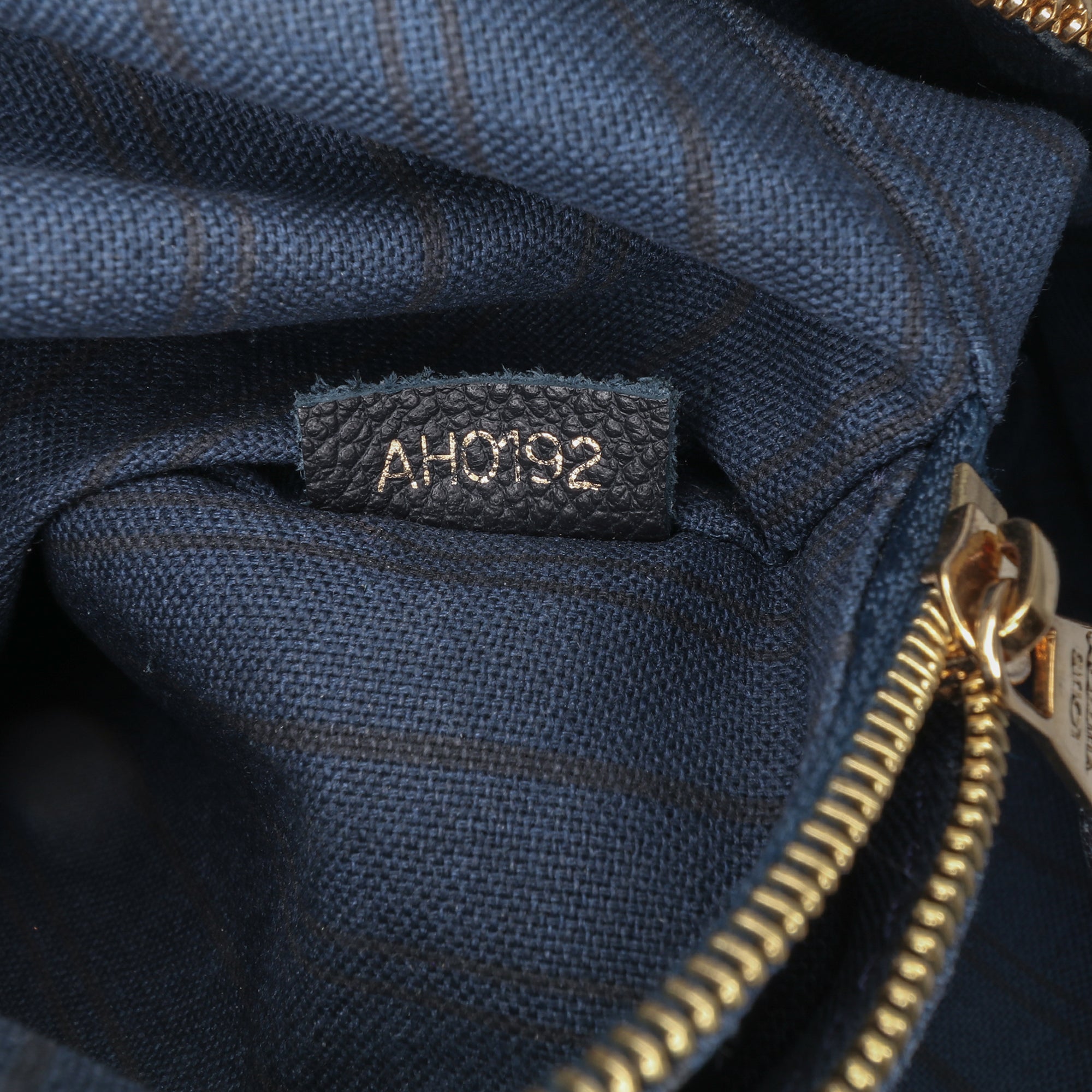 Monogram Empreinte Lumineuse PM