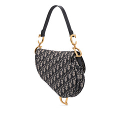 Oblique Canvas Saddle Bag