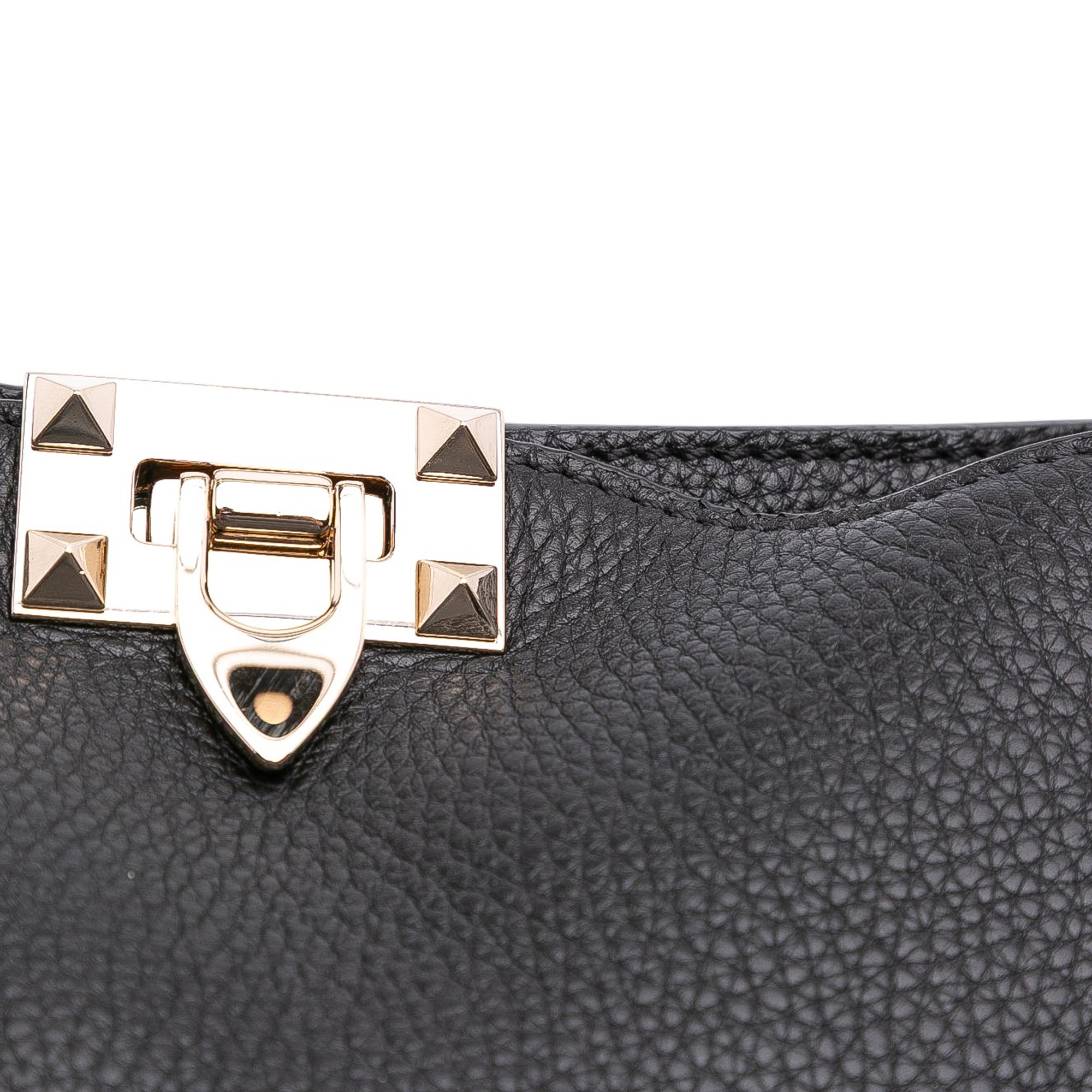 Small Grainy Calfskin Rockstud Flip Lock Messenger Bag