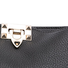 Small Grainy Calfskin Rockstud Flip Lock Messenger Bag