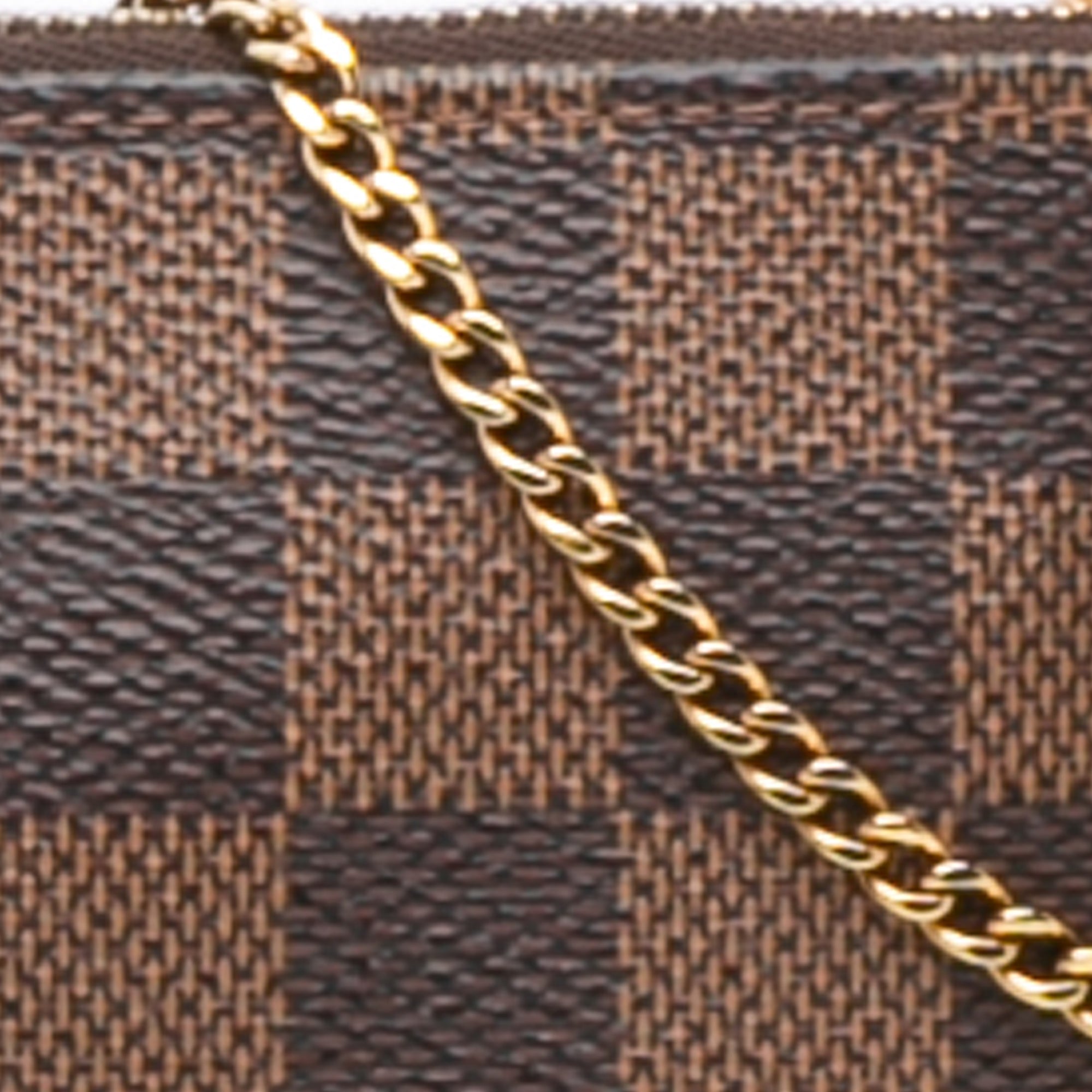 Damier Ebene Mini Pochette Accessoires