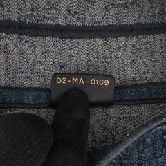 Oblique Embroidered Denim Saddle Bag