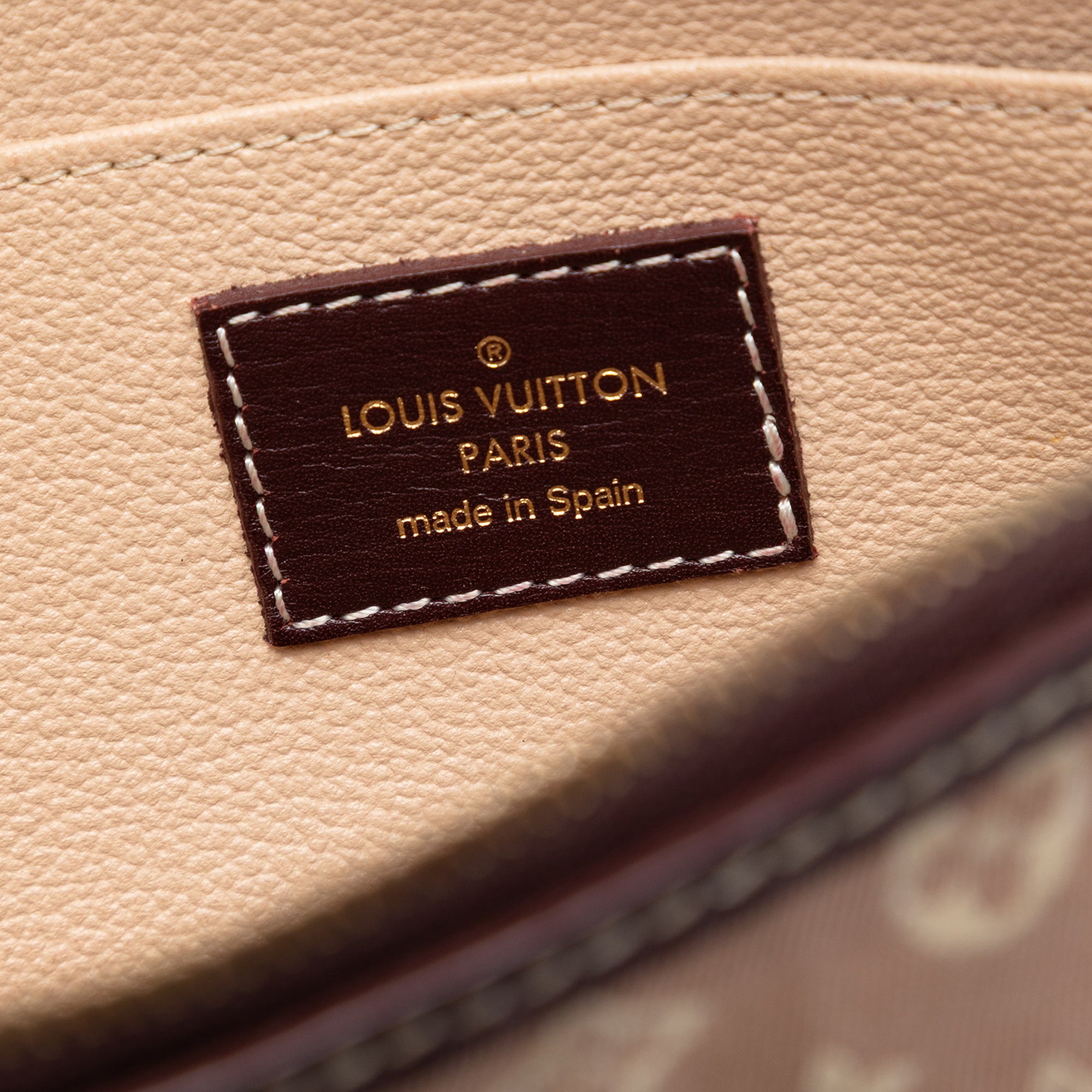 Monogram Mini Lin Cosmetic Pouch