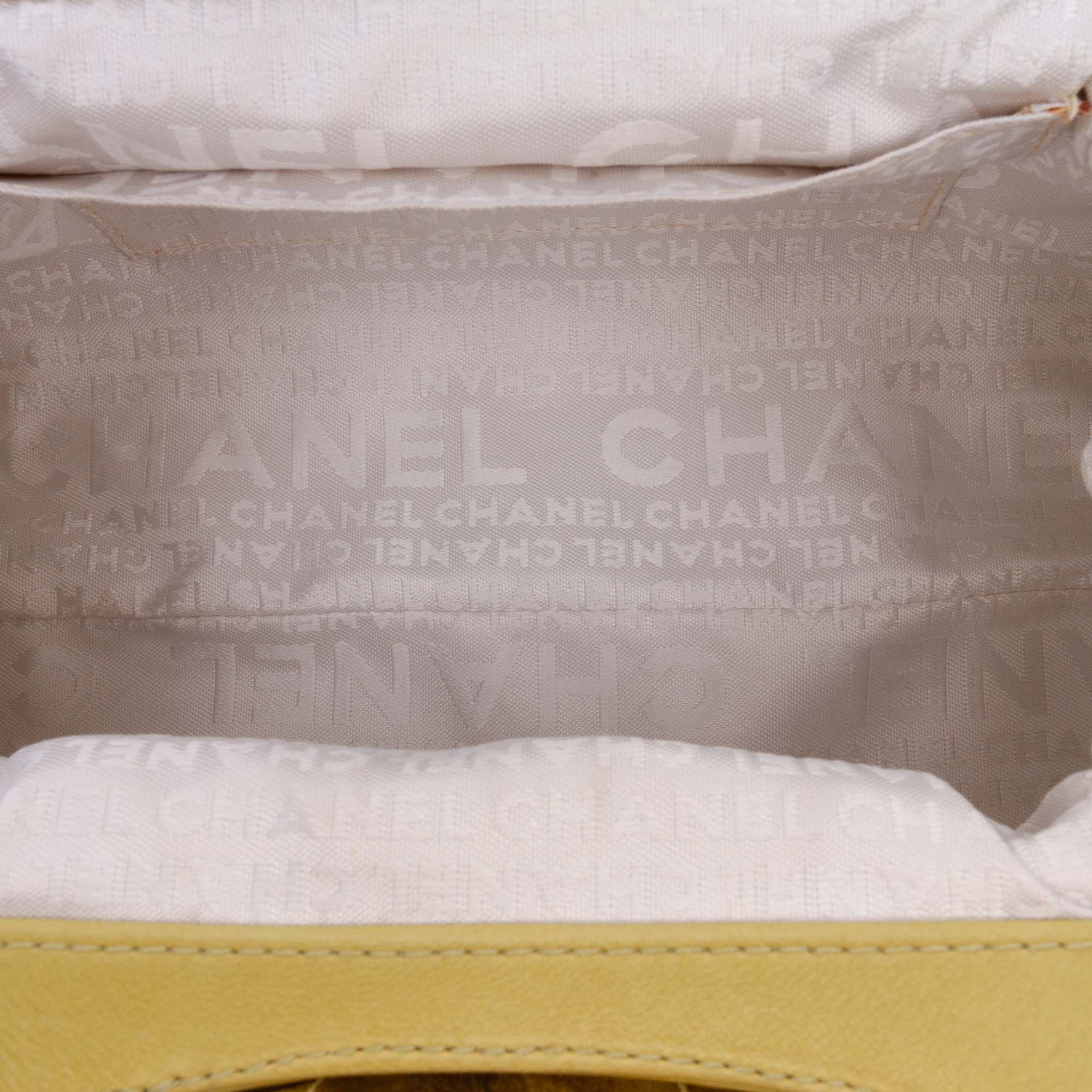 Lambskin Camellia Frame Clutch