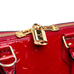 Monogram Vernis Alma PM