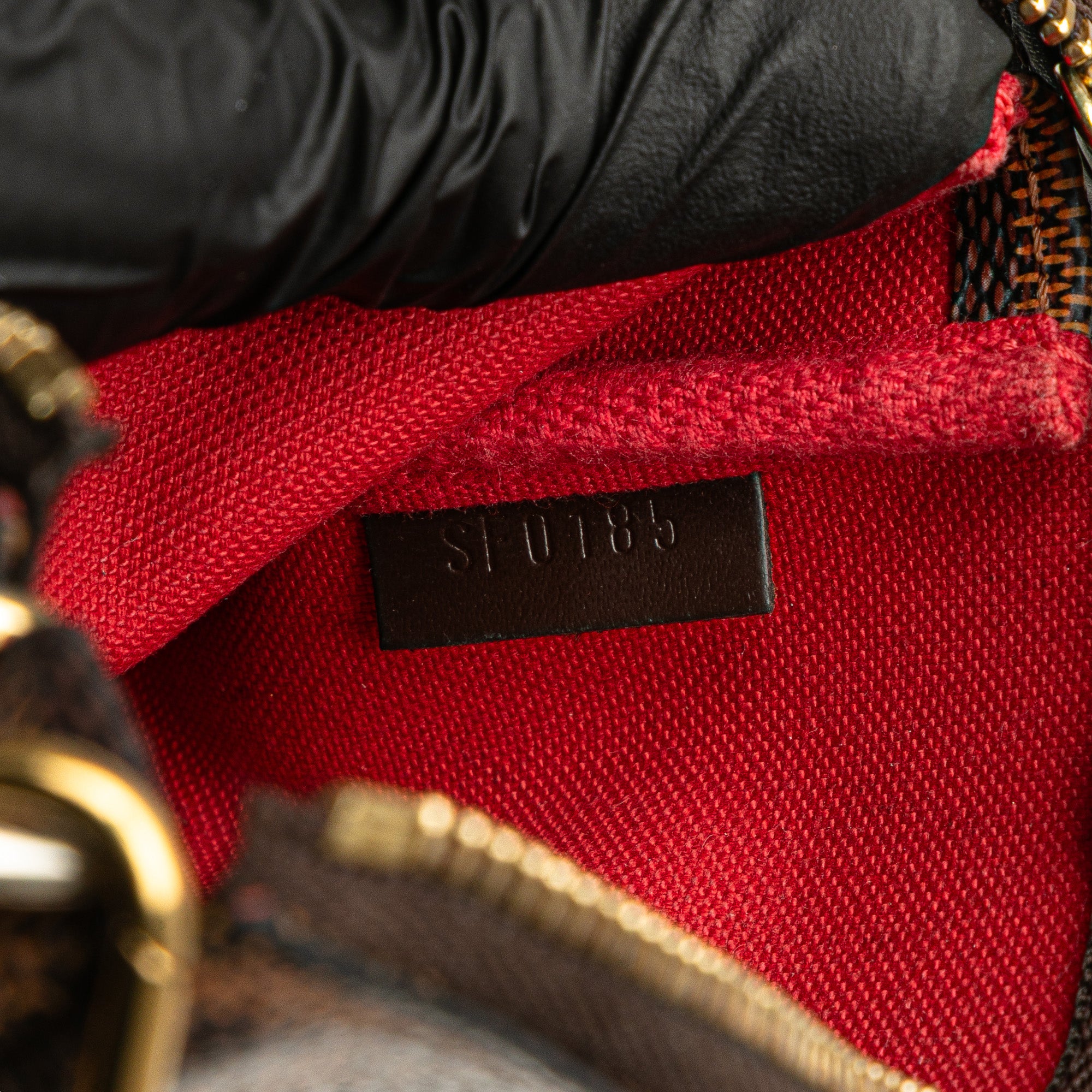 Damier Ebene Mini Pochette Accessoires
