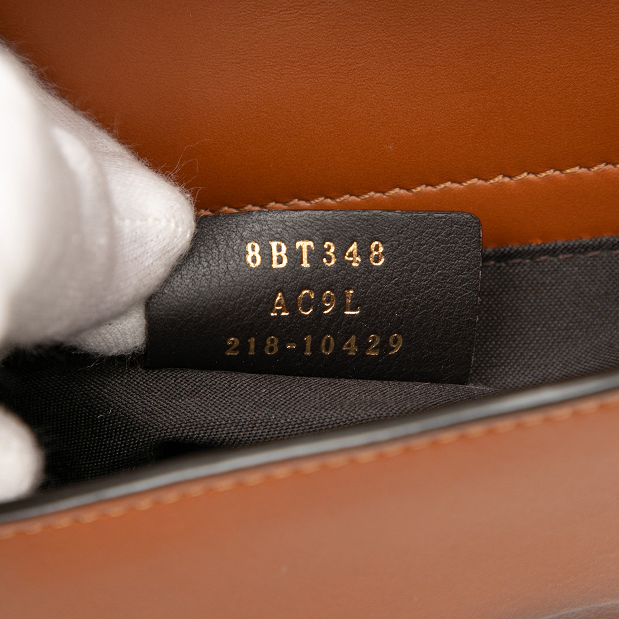 Leather Debossed Logo Bucket Bag