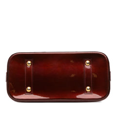 Monogram Vernis Alma PM