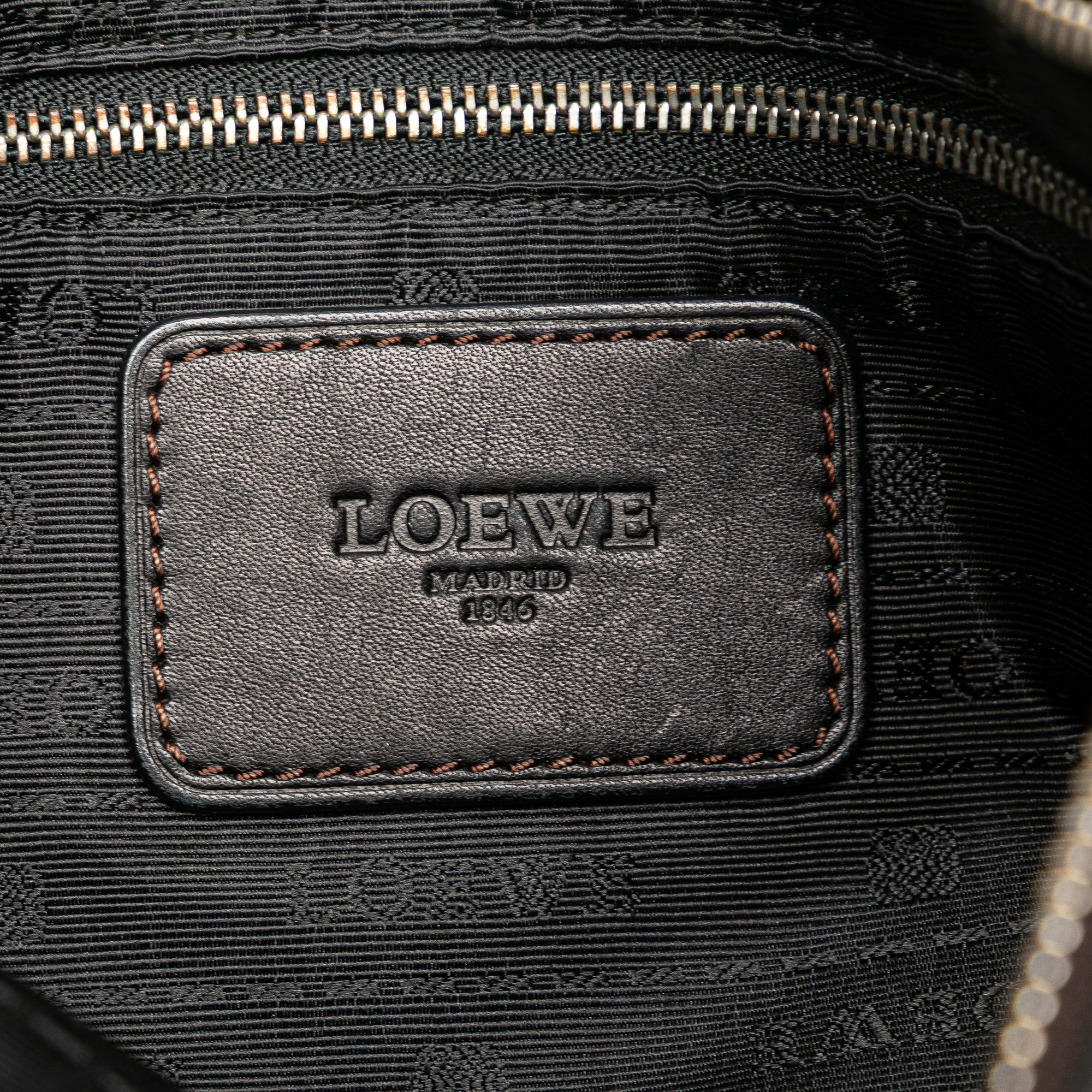 Anagram Leather Messenger Bag