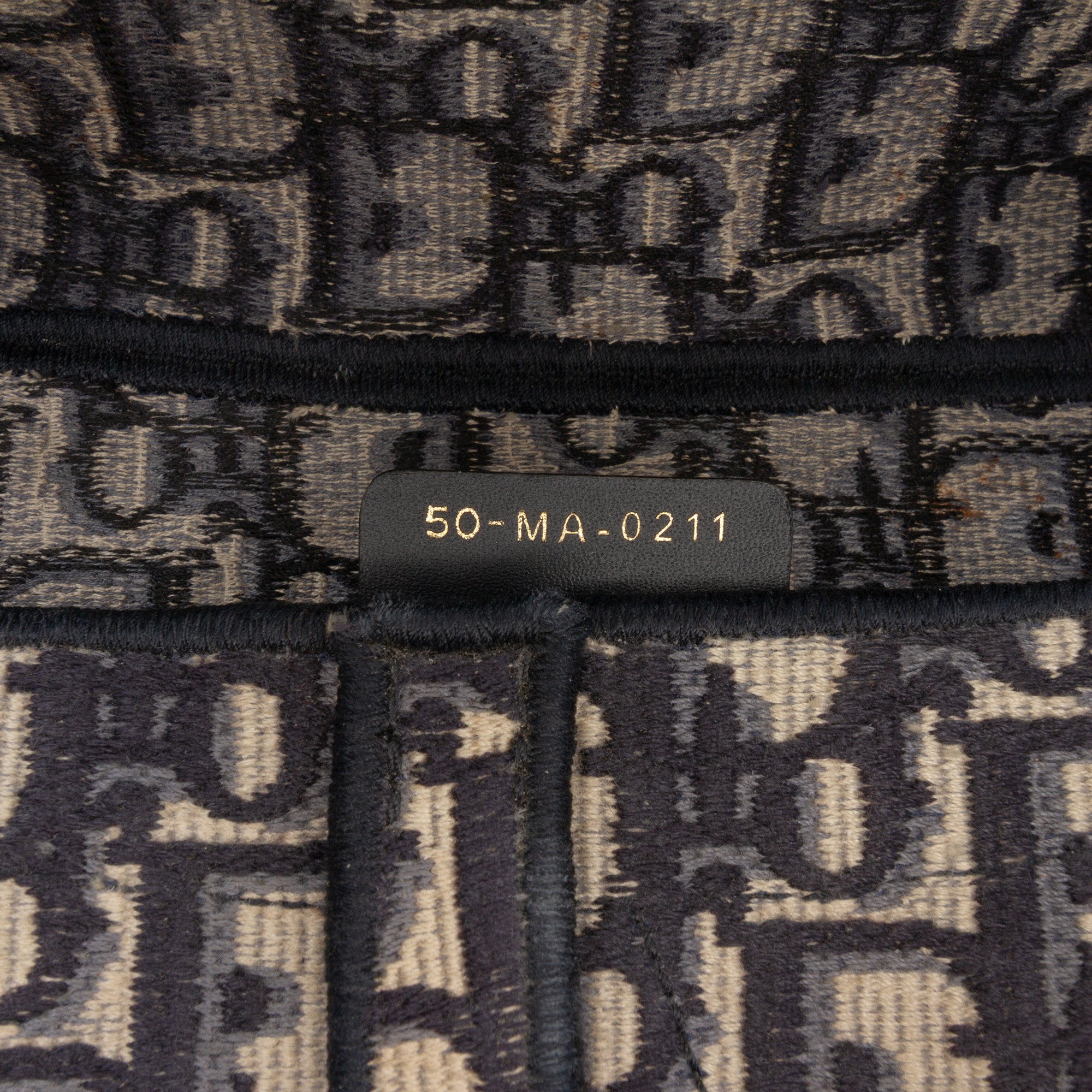 Oblique Embroidered Canvas Saddle Bag