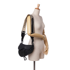Oblique Embossed Calfskin Saddle Bag