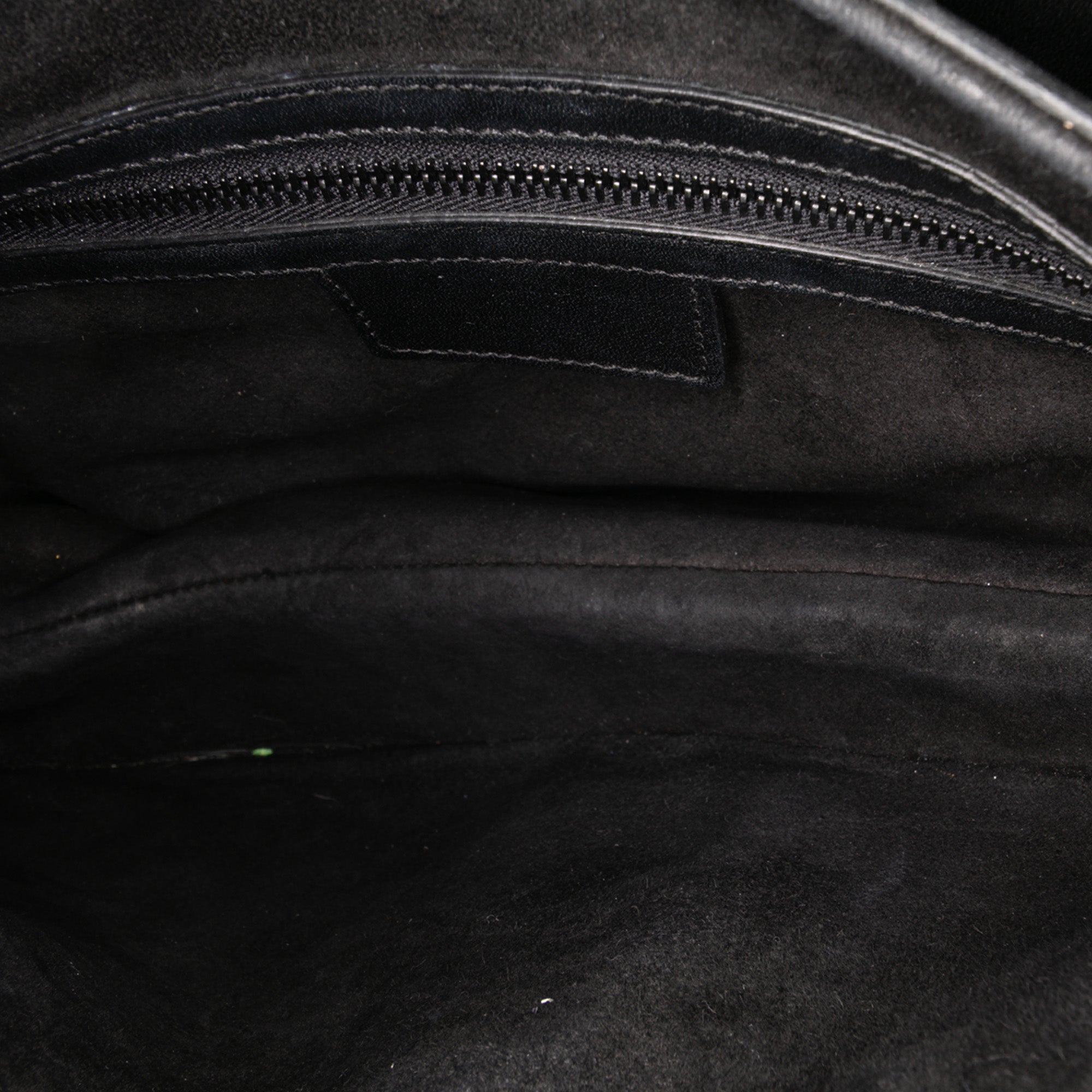 Oblique Embossed Calfskin Saddle Bag