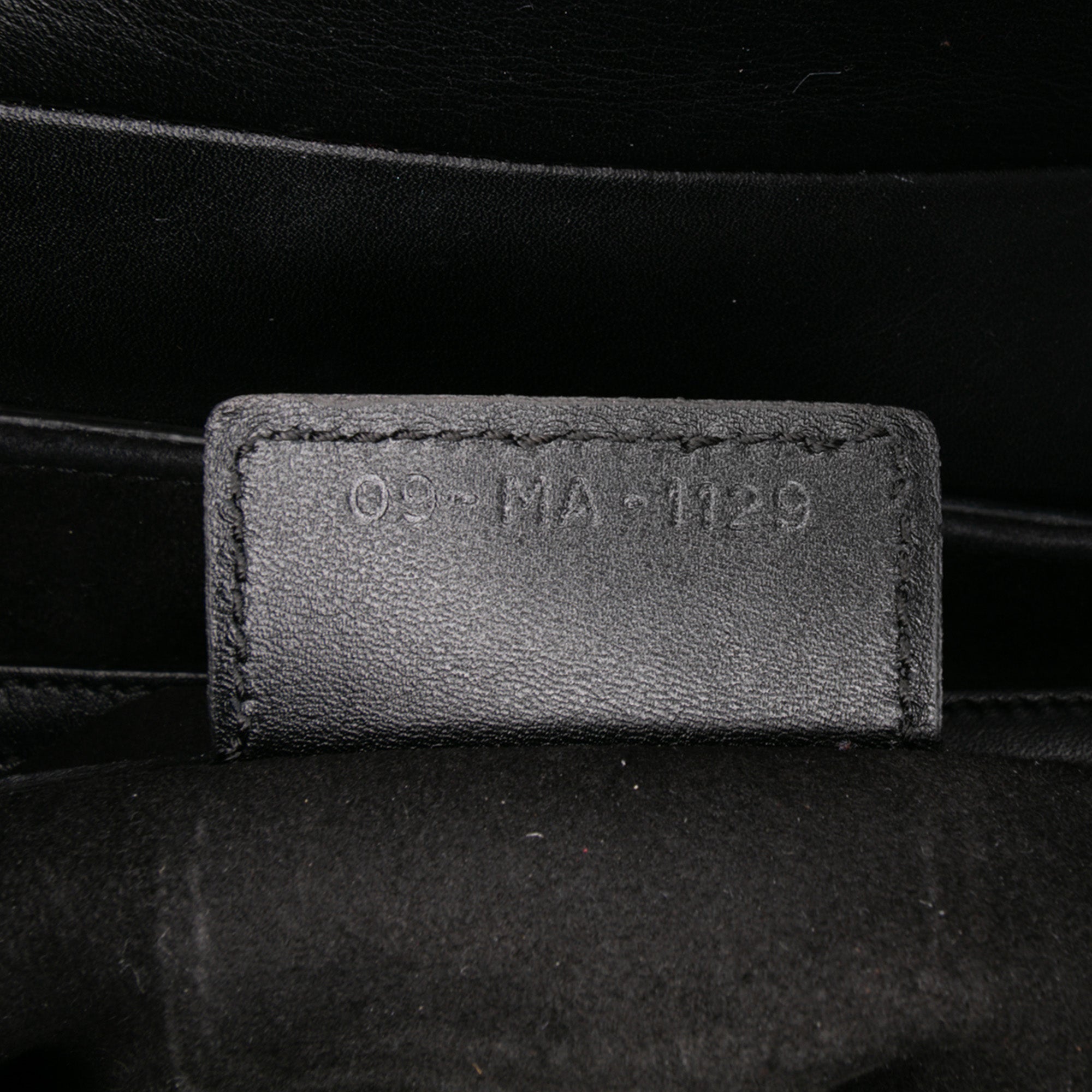 Oblique Embossed Calfskin Saddle Bag