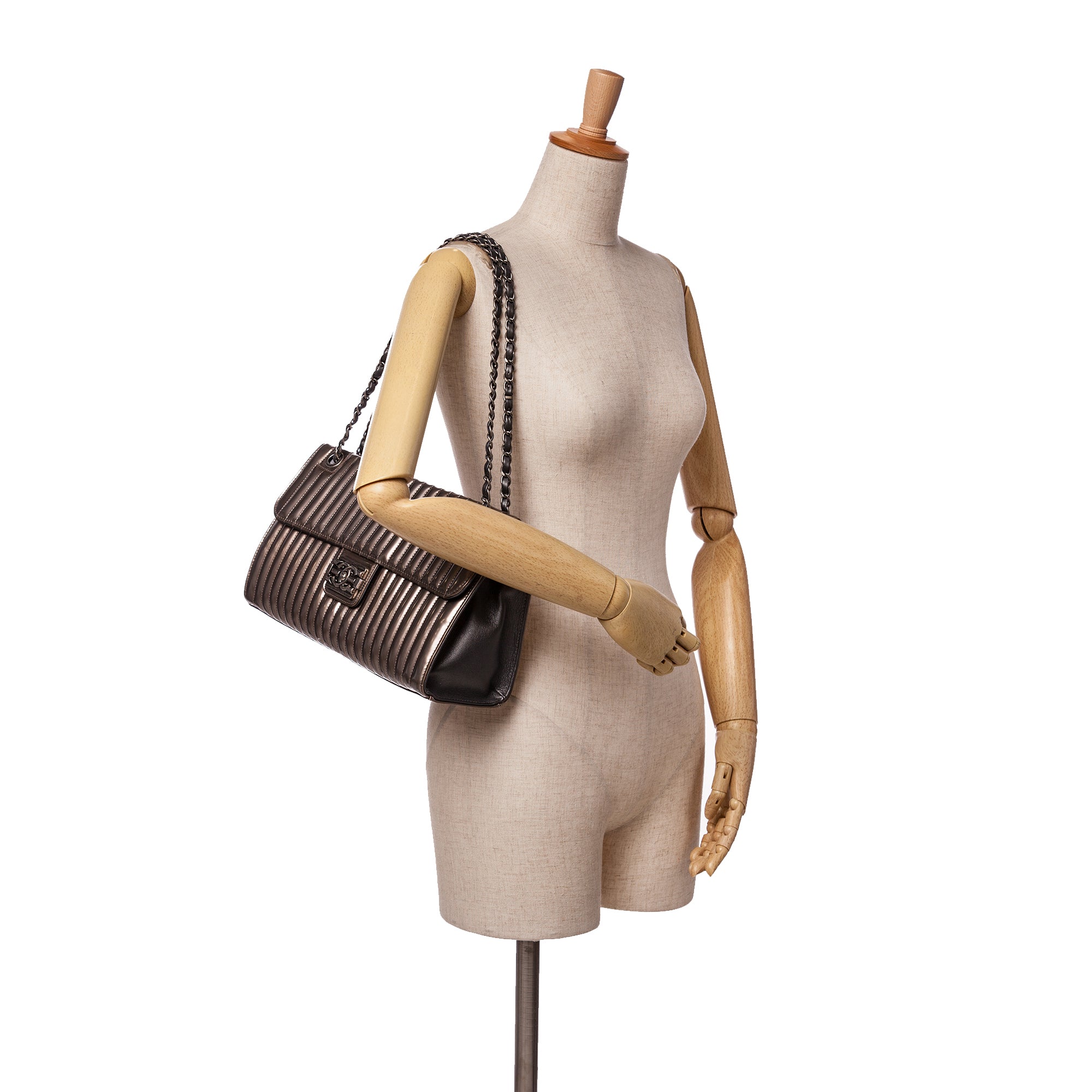 Vertical Quilted Patent Maharaja Express Flap