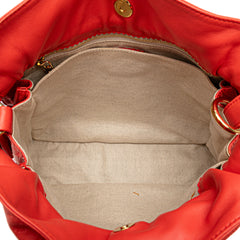 Embossed Leather Flamenco Tassel Crossbody