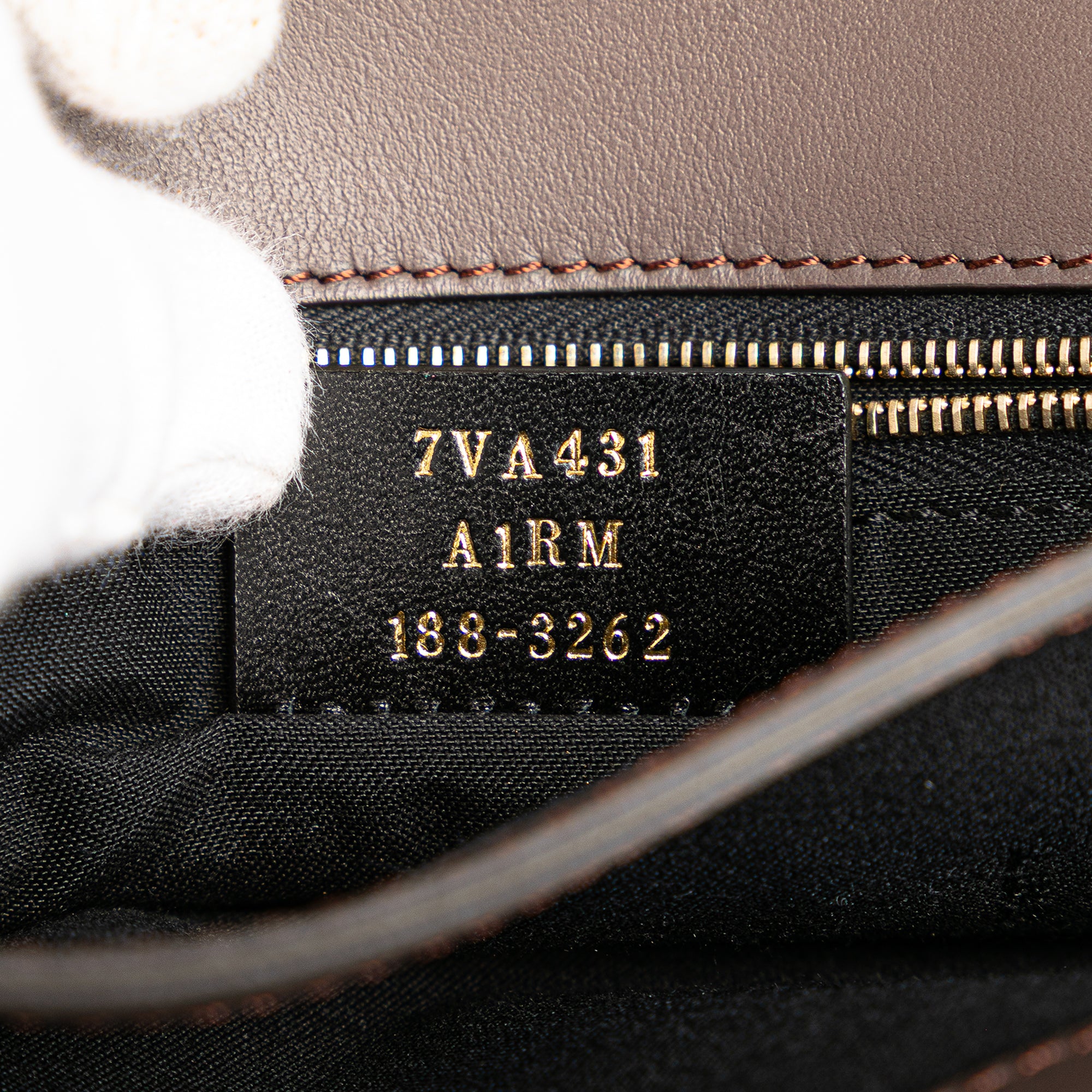 Zucca Embossed Leather Handle Clutch