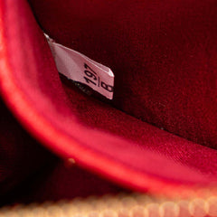 Vitello Shine Bow Wristlet Clutch