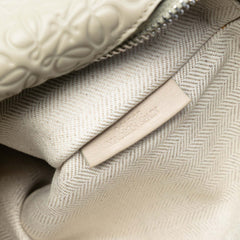 Embossed Leather Anagram Repeat T Clutch